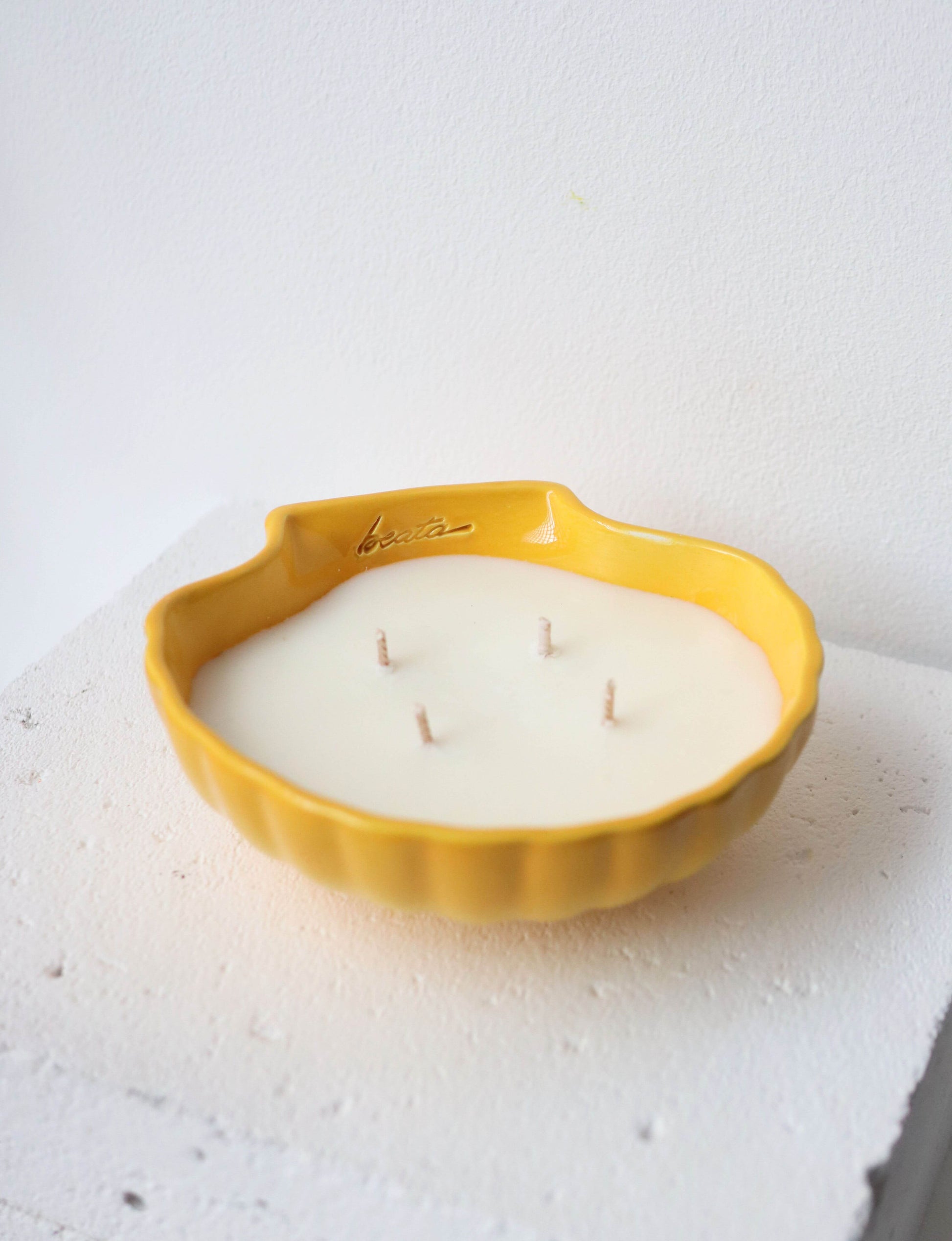 Bougie coquillage ceramique jaune