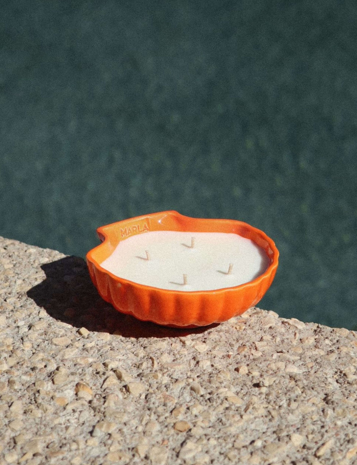 bougie coquillage orange