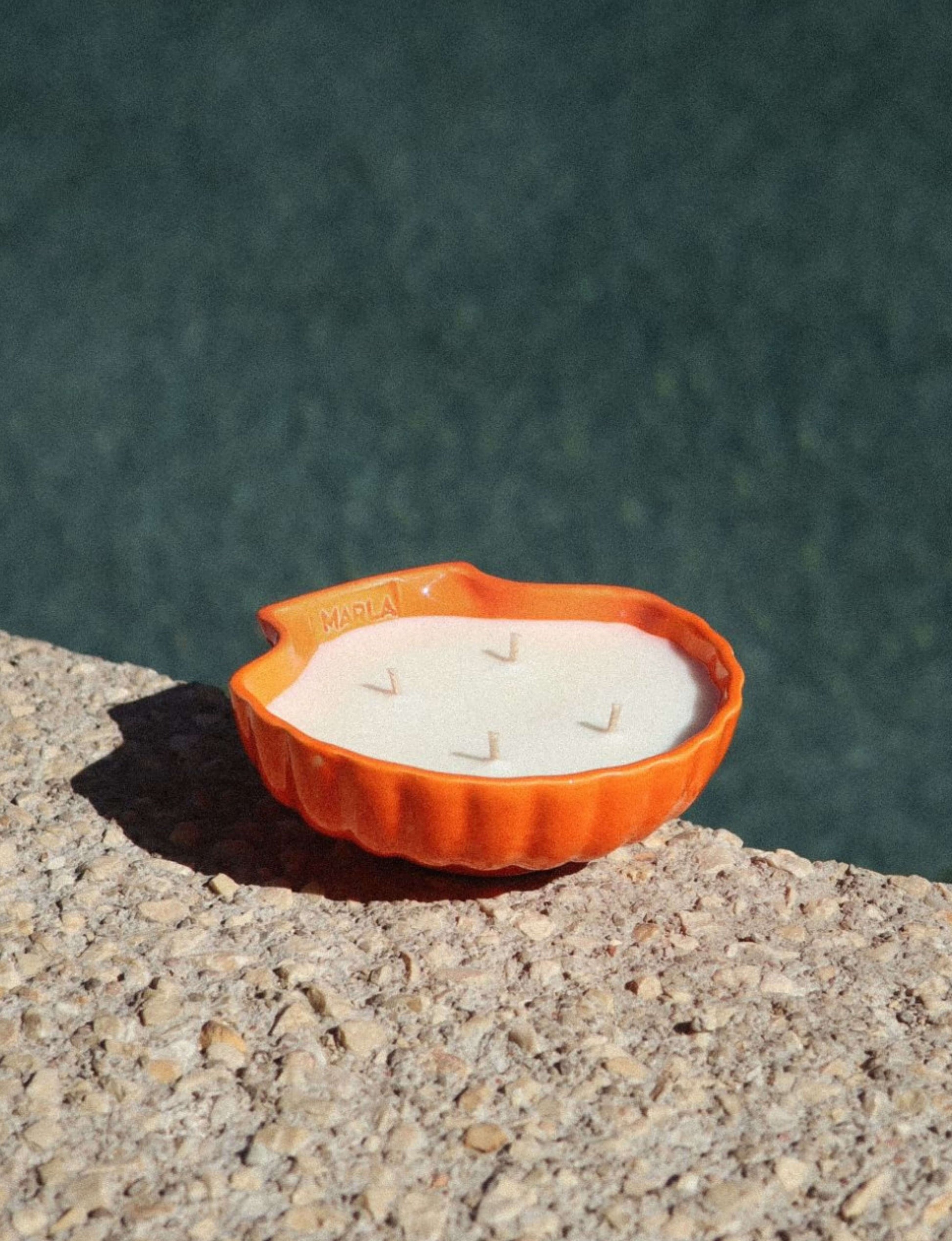 bougie coquillage orange