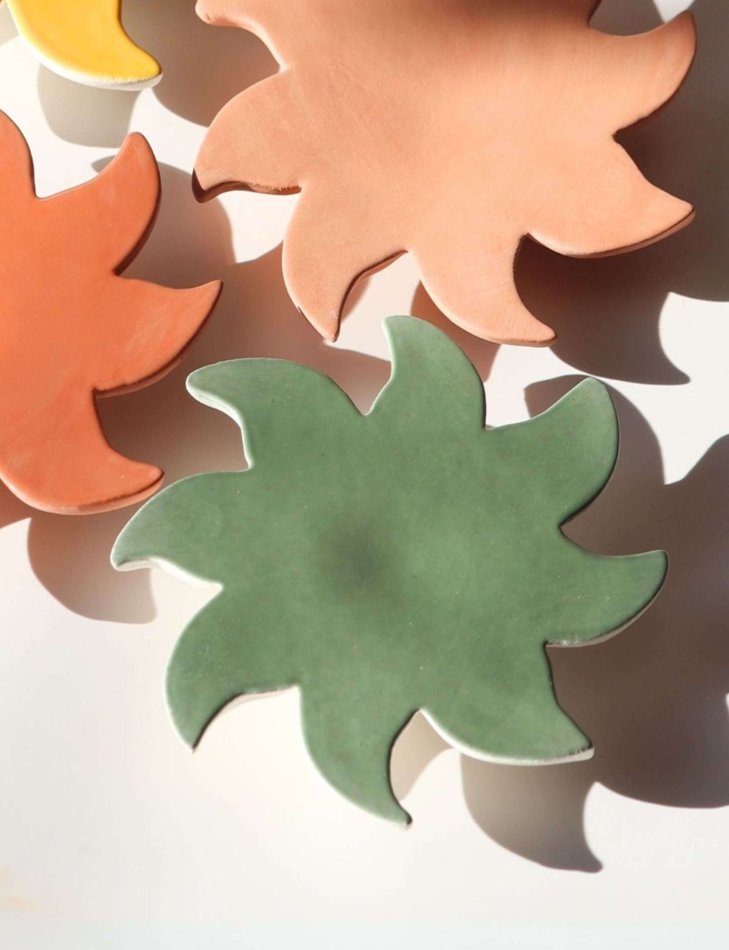 soleil décoratif mural en céramique