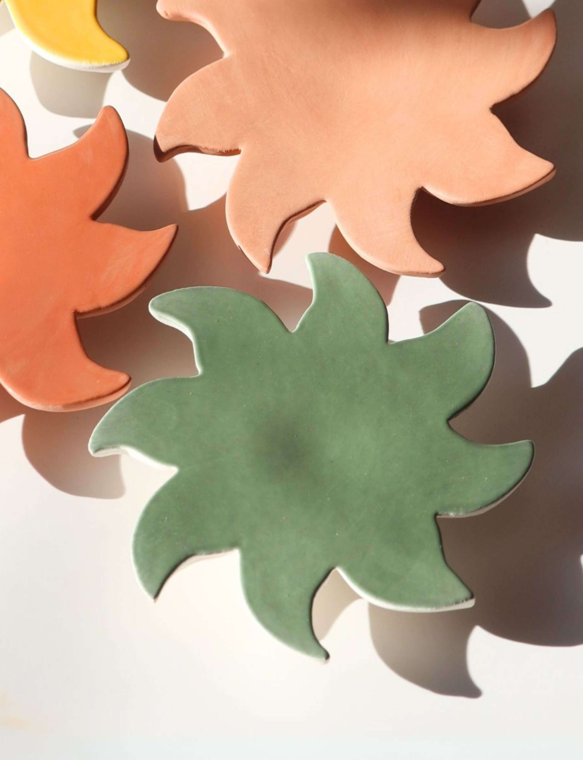 soleil décoratif mural en céramique