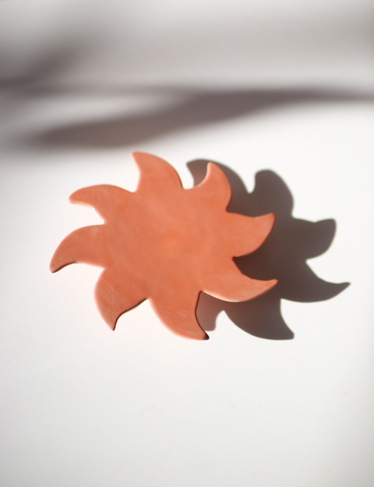 soleil mural terracotta